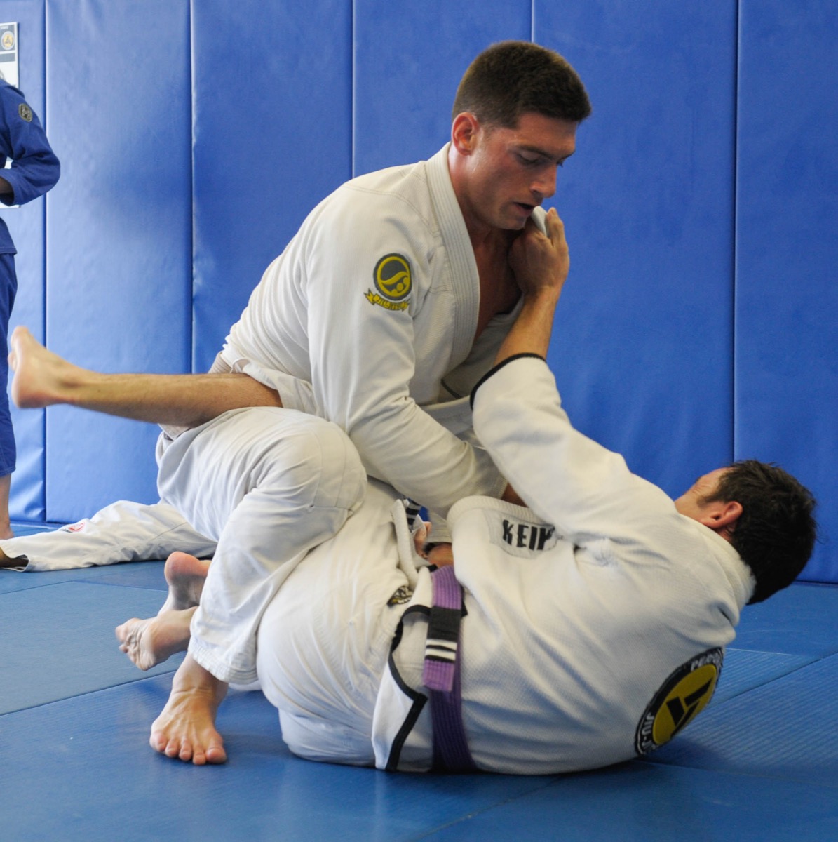 Adults grappling during a Gracie Jiu-Jitsu class at Performance Jiu-Jitsu in Bergen County, NJ